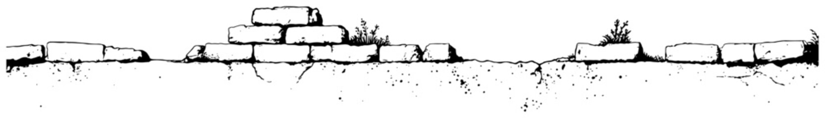 Obraz premium Old ruined stone wall with grass growing on top