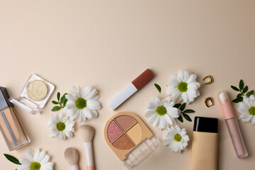 Makeup cosmetics and flowers on pastel background top view. Spring, new products, updates. place for text © Fotomoment001