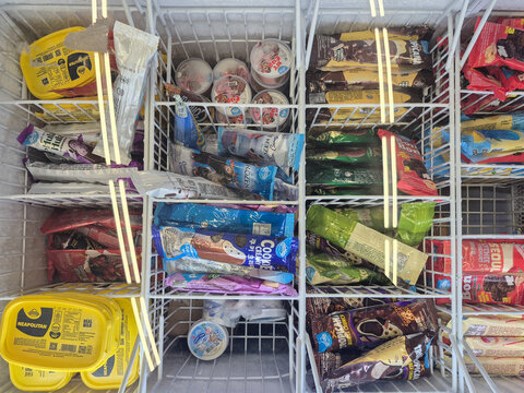 Various Wall's ice cream products displayed in a supermarket freezer. A variety of frozen treats for retail and consumer shopping concepts. Bontang, Kalimantan Timur, Indonesia. February 25 2026