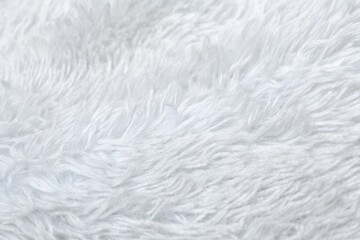 White shaggy faux fur fabric texture background  © Design Infinity