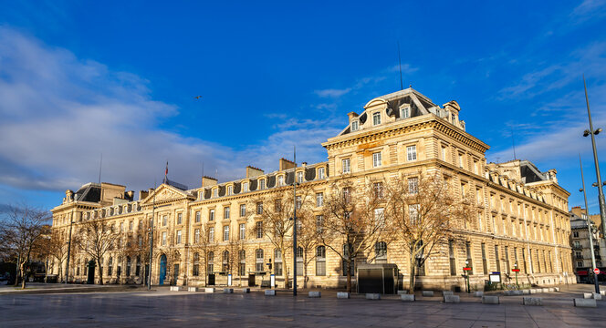 Scenic sunny view of the historic classical stone facade of the Caserne Verines building at the Place de la Republique square in Paris, France.
