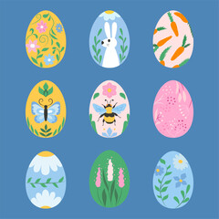 Set of nine decorated Easter eggs with floral, animal and carrot patterns on blue background. Concept of Easter holiday design