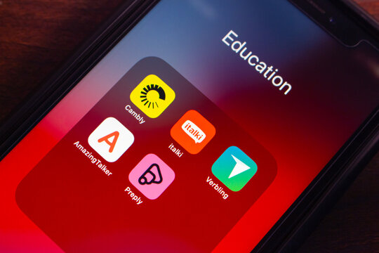 Mexico City, MEXICO - Apr 16 2025 : Close-up smartphone screen showing education folder with online language tutoring app icons like Cambly, italki, Preply, Verbling, AmazingTalker, mobile learning.