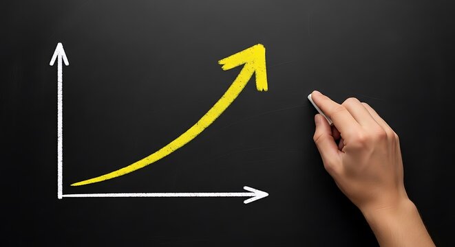Hand yellow arrow on blackboard graph chalk chart