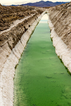 USA, CA, Amboy.   Chloride mine evaporation trench in the Amboy Salt Flats.  Mojave Desert