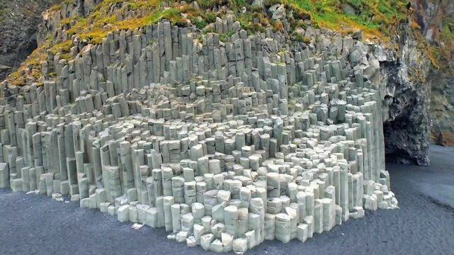 Aerial view of the stunning basalt columns on the famous Reynisfjara black sand beach in Iceland