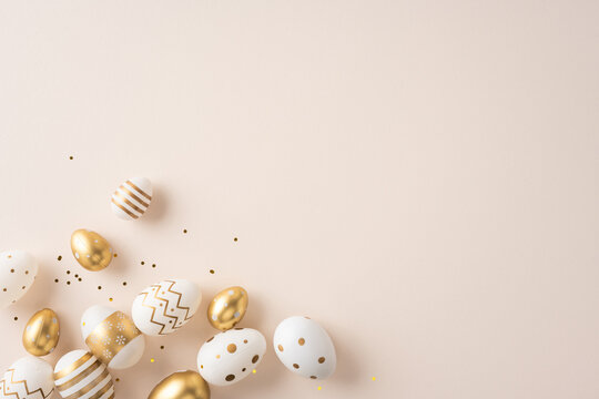 Happy Easter greeting featuring elegant white and gold decorated eggs scattered on a soft pastel background for spring celebration and festive decoration