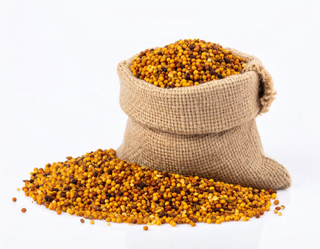 Nutrient-Rich Golden Millet Grains Overflowing from a Natural Burlap Sack on a Pristine White Background, Ready for Wholesome Culinary Uses