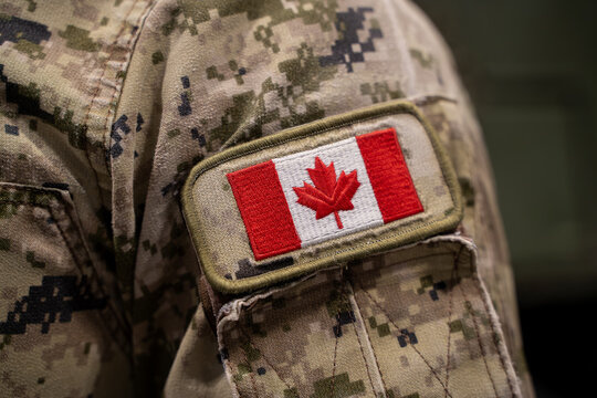 Close up of Canadian flag patch on military uniform