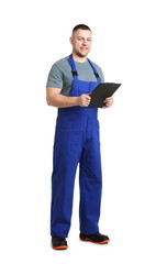 Handsome repairman with clipboard on white background