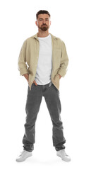 Naklejka premium Serious man in shirt posing on white background