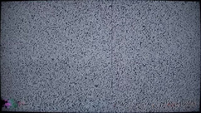 Static Noise on Television Screen, Analog TV Signal Interference, White Noise Background.