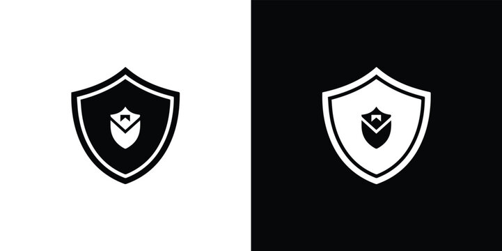 Black and white shield with graduation cap symbol