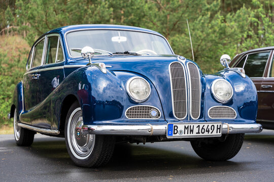 LINTHE, GERMANY - JUNE 08, 2025: The elegant blue luxury sedan BMW 501 "Barockengel" from the late 1940s early 1950s. Die oldtimer show.
