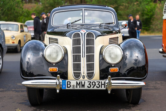 LINTHE, GERMANY - JUNE 08, 2025: The classic bicolor black and beige 2-door coupe EMW 327, 1952. Die oldtimer show.