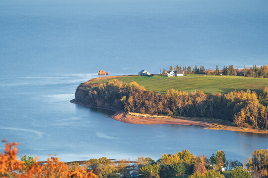 Aerial view of the countryside of rural  Nova Scotia's Annapolis Valley with farms, orchards and the Bay of Funday.