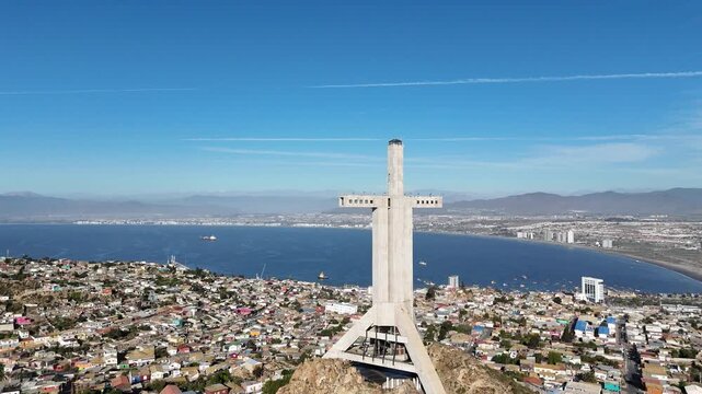 Cross of the Third Millennium monument in Coquimbo, Chile. Huge concrete cross on a hilltop overlooking the city and bay.