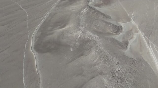 4K aerial cinematic shot of Atacama Giant geoglyph on Cerro Unitas. Ancient archaeological anthropomorphic figure in Chile.