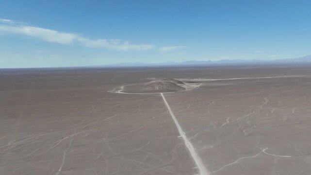 4K aerial cinematic shot of Atacama Giant geoglyph on Cerro Unitas. Ancient archaeological anthropomorphic figure in Chile.