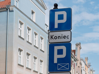 Gdansk Street Parking Sign with City Architecture