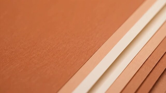 A vintage red corrugated cardboard texture overlaps a closeup stack of old books and brown wooden boards to create a rough grunge material backdrop with a patterned paper surface