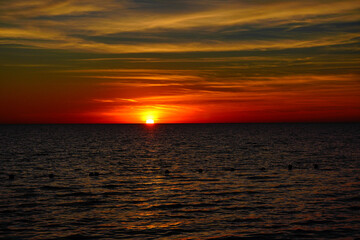 Fototapeta premium The sun set landscape of gulf of America and Port Richey in Florida