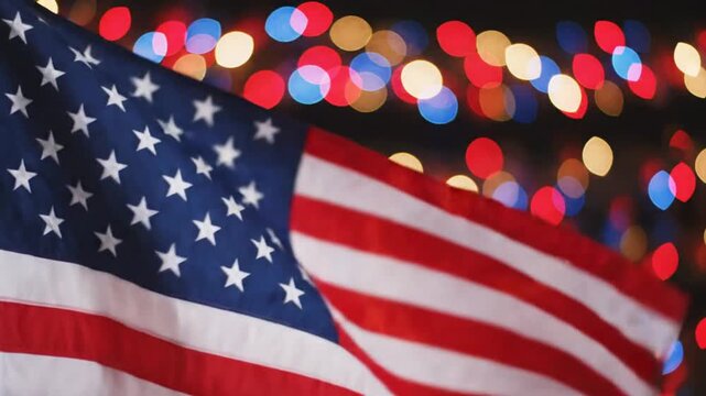 american flag waving with bokeh lights in the background
