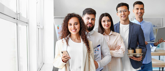 Young business colleagues working in office