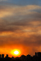 A thick layer of smoke covered the brazilian city during the late afternoon. The hot, dry weather and the air heavy with smoke make it harder for people to breathe.