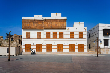 Traditional architecture with wooden mashrabiyas in Al-Balad, Yanbu's historic district on the Red Sea coast of Saudi Arabia