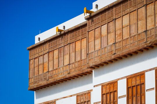 Traditional architecture with wooden mashrabiyas in Al-Balad, Yanbu's historic district on the Red Sea coast of Saudi Arabia