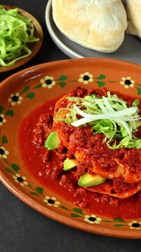 Rustic Mexican food background with fresh ingredients, Mexican pambazo or chancla poblana, camera view from left to right