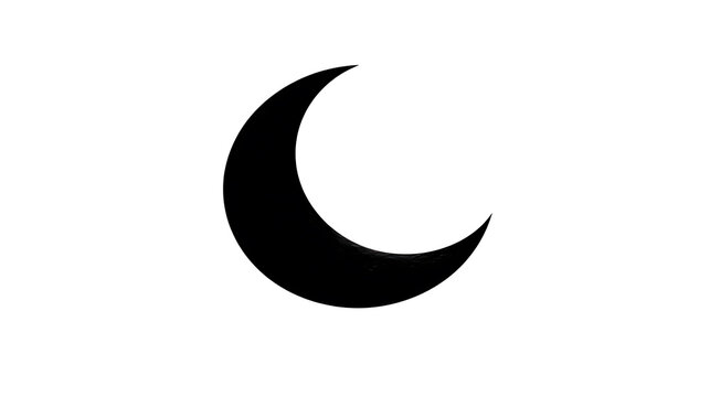 A simple crescent moon on a clear night. The black shape against the light sky evokes a sense of peace and mystery