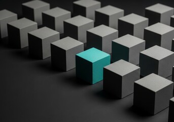 Fototapeta premium Single teal cube placed among uniform gray cubes on dark background, illustrating competitive advantage, brand distinction, and strategic superiority in business markets