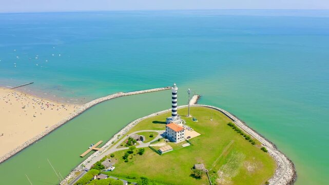 Italy, Jesolo. Light House Faro di Piave Vecchia. Lido di Jesolo, is the beach area of the city of Jesolo in the province of Venice. Drone footage, Point of interest