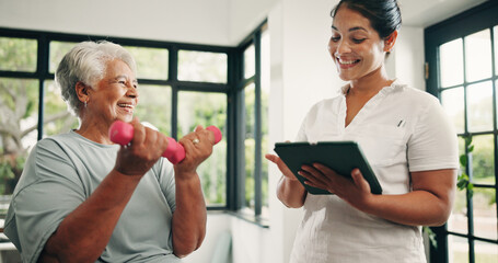 Tablet, physiotherapist and old woman with dumbbells, exercise or laugh in medical clinic. Tech,...