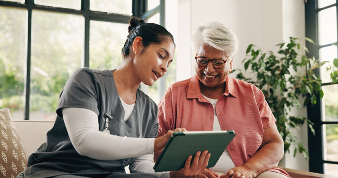 Healthcare, tablet or talking with nurse and old woman in home living room for feedback or review. App, conversation or medical checkup with caregiver and senior patient in apartment for diagnosis