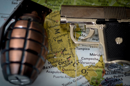 Map of Mexico with Grenade and Handgun Symbolizing Violence and Security Concerns