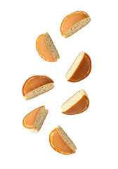 Six fortune cookies floating in the air, cut in half to reveal their inner vanilla cookie, isolated on transparent background