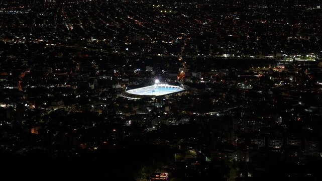 Panoramic ground-level view of Estadio Ol&iacute;mpico Pascual Guerrero located in Cali, showing the exterior structure and surrounding urban setting. The image highlights the scale and architectural design