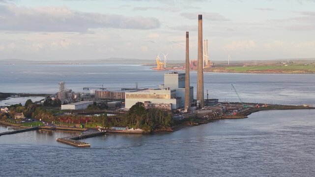 Aerial View of Tall Smoke Stacks at Tarbert Power Station on the Shannon Estuary.