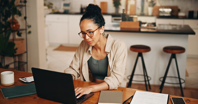 Remote work, finance or woman at table with laptop, profit change or news update on investment return. WFH, typing or analyst in house with tech, budget review or revenue growth on client account.