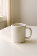 Obraz premium Minimalist white mug on table.