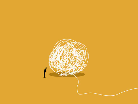 businessman analyzed and untangle the tangled mess