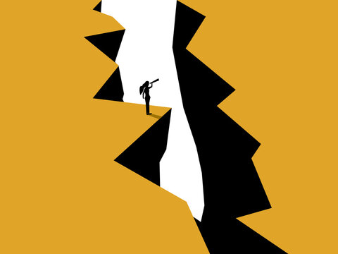 businesswoman peered through a gap in the cliff face using binoculars