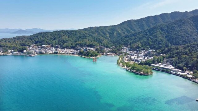 Aerial view of a serene coastal landscape with clear turquoise waters