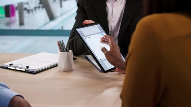 Digital Deed: Young African Couple Signs Contract