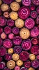 Close-up view of sliced purple and yellow carrots arranged in a pattern