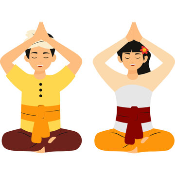 Balinese Couple Praying in Nyepi Day
