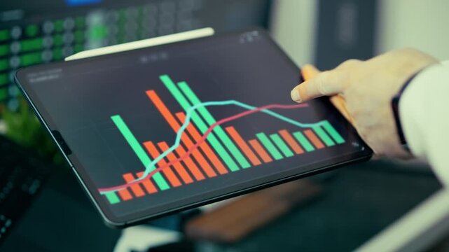 Financial performance analysis tablet dashboard storytelling concept. Manager reviewing growth metrics during strategic meeting, colorful bar charts rising across touchscreen display, trend lines